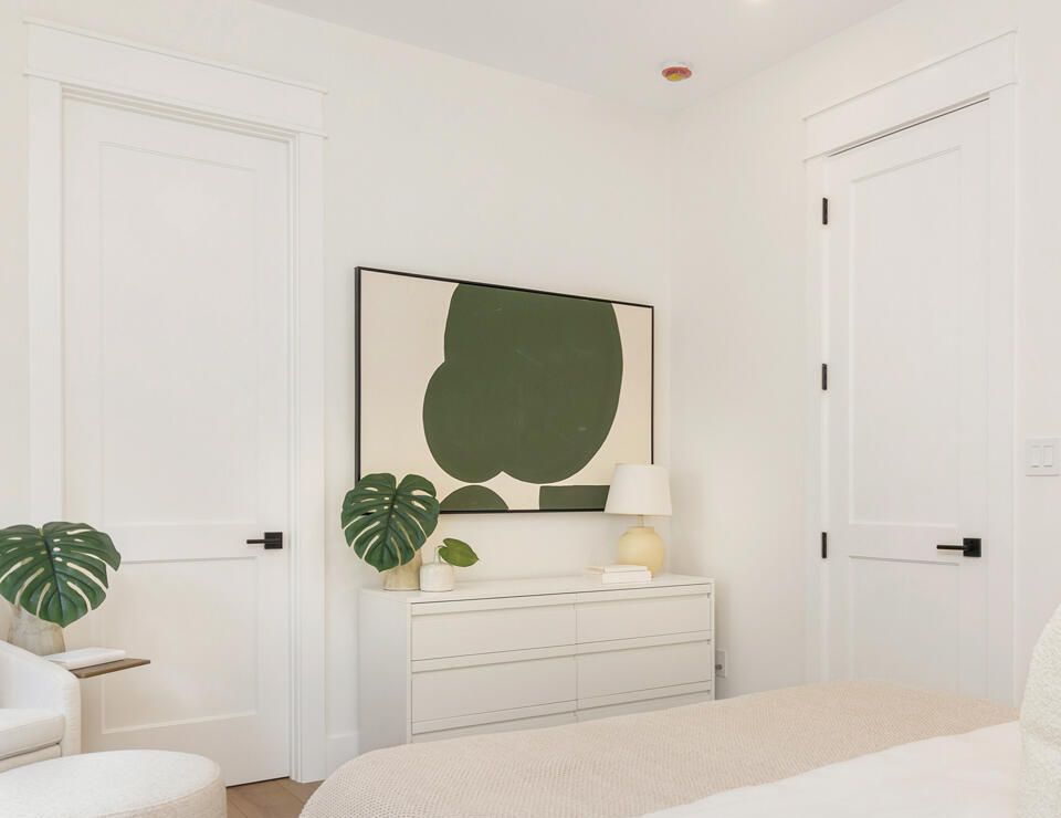 Two white interior doors cased to match in a bedroom, West Palm Beach