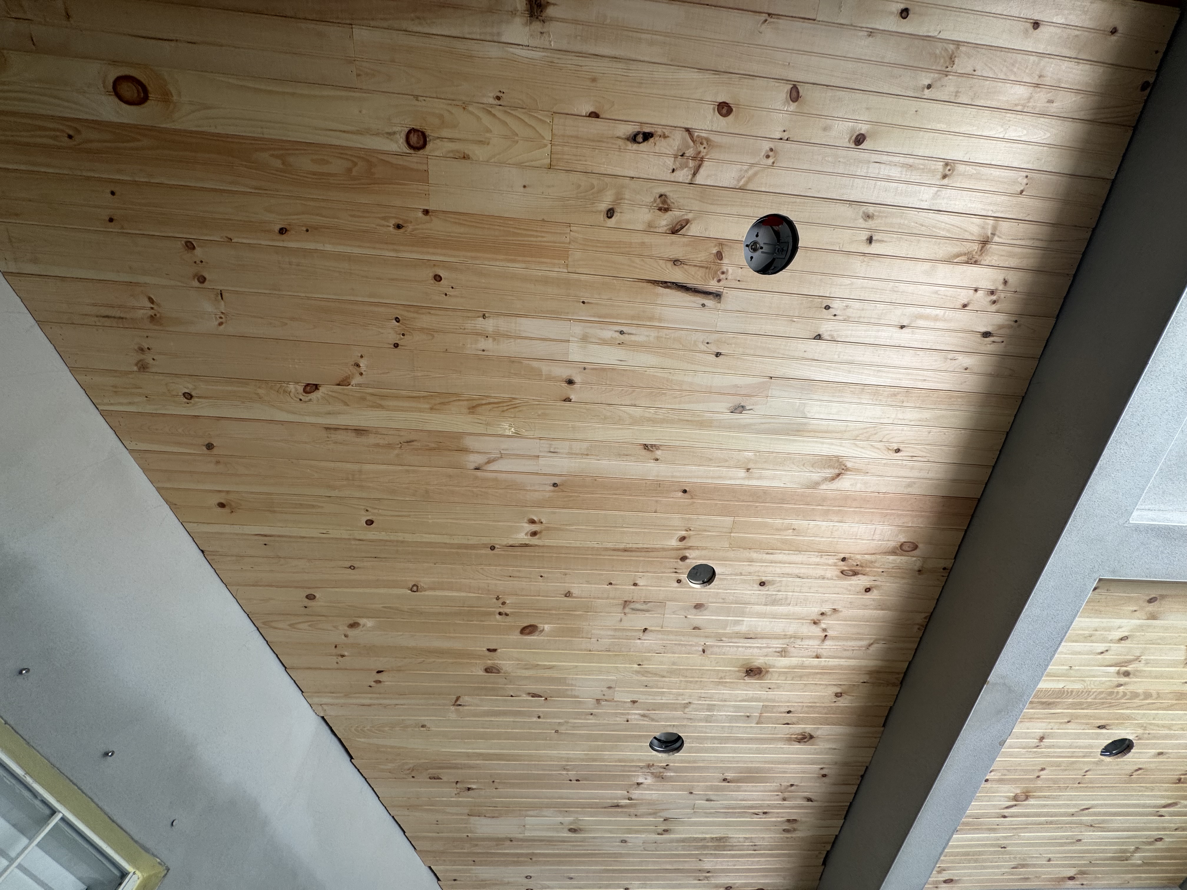 Tongue-and-groove ceiling millwork, looking up