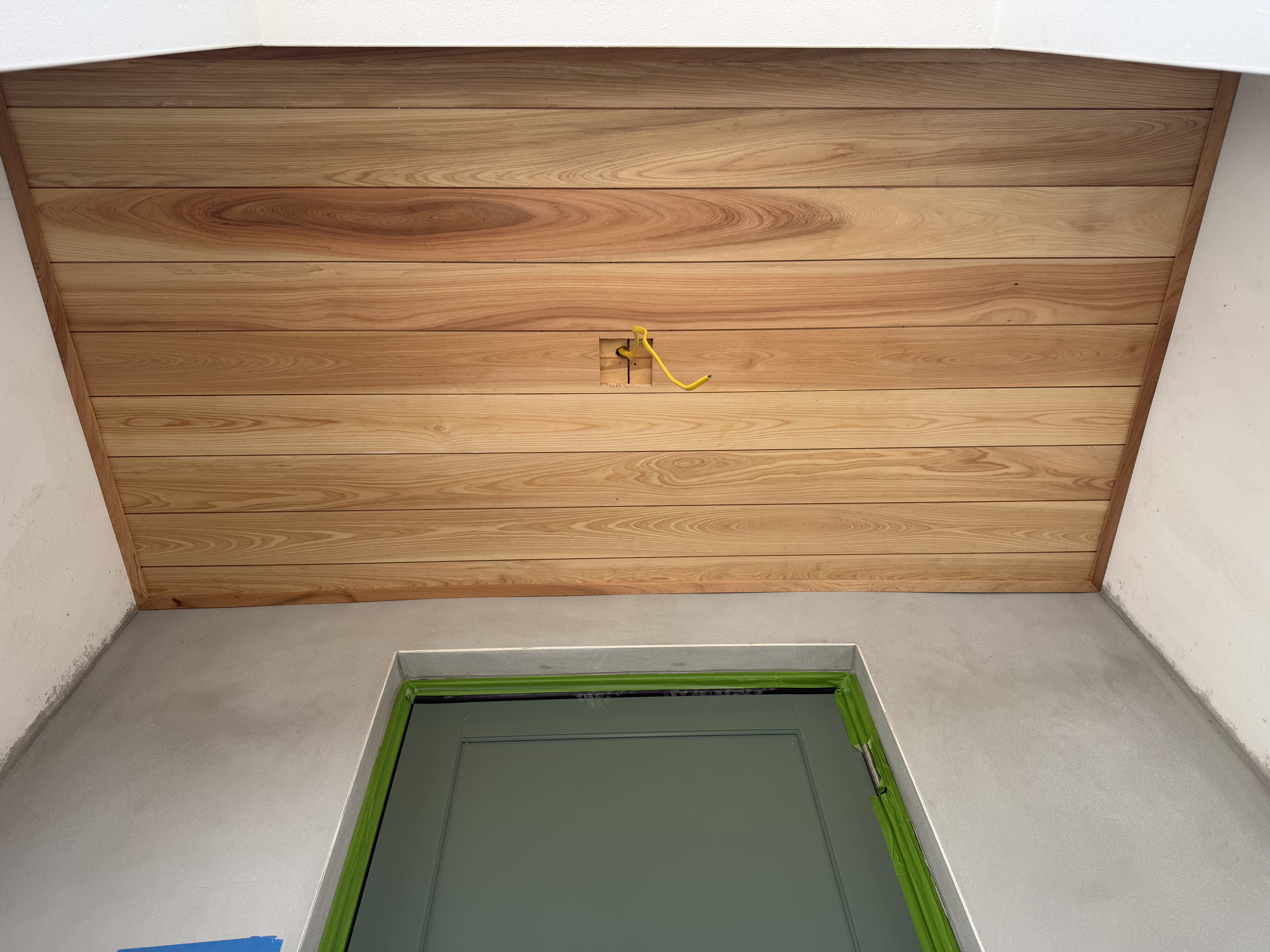 Tongue-and-groove soffit with matching wood trim